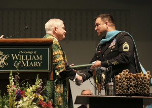 College of William and Mary Chancellor Robert Gates '65 introduces Sergeant First Class Leroy Petry, who served as this year's Commencement speaker. COURTESY PHOTO / WM.EDU 