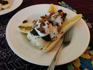 A vegan banana split can be made by substituting soy ice cream and whipped coconut cream for the dairy products and using homemade chocolate sauce. COURTESY PHOTO / MEGAN PHILIPS