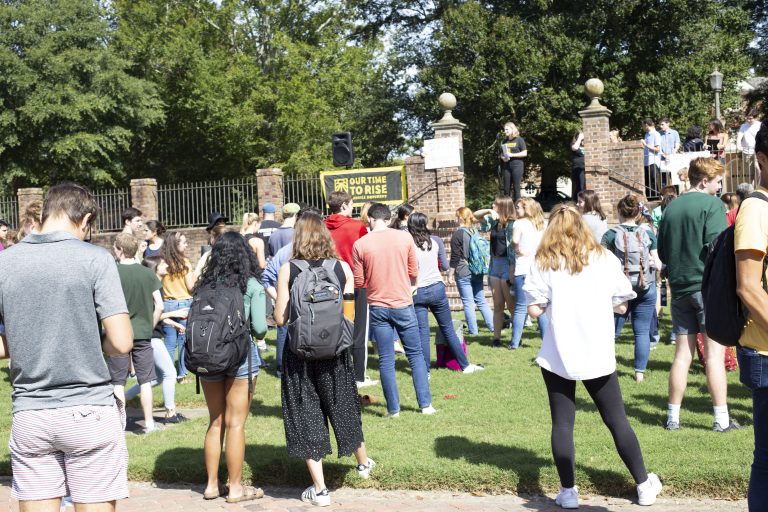 Students gather on the Sunken Gardens to listen to speakers in the Climate Strike