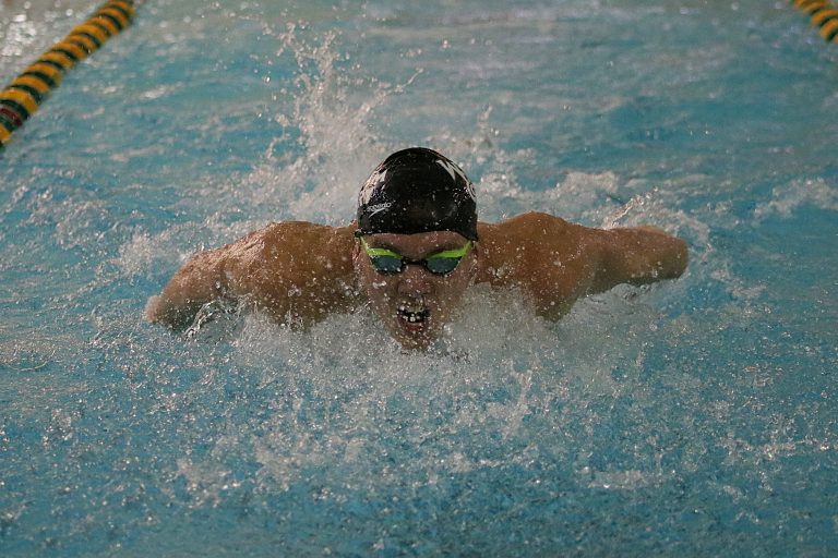 Swimming: Tribe men’s team defeats Towson; women’s team narrowly defeated