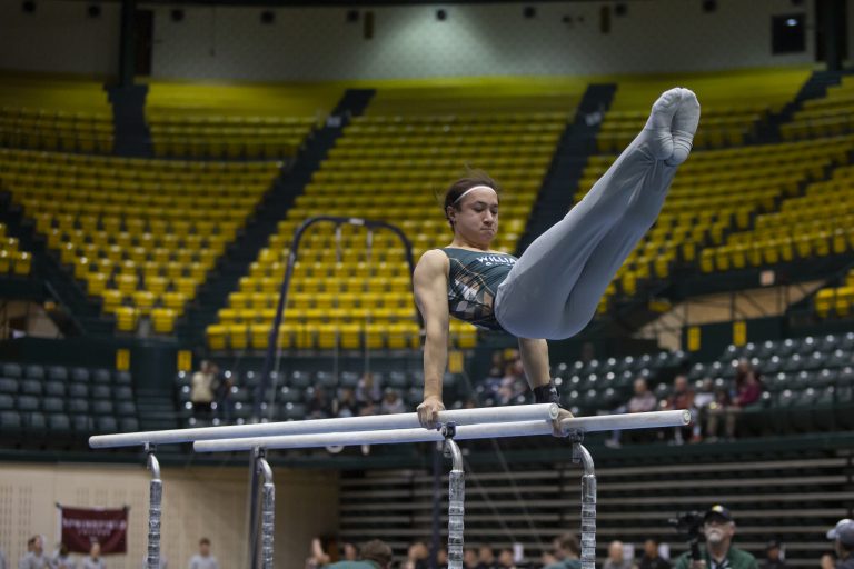 Cuy leads men’s gymnastics to fourth place finish at Navy Open