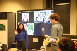 Review Board Chair Clay Coleman '23 swears in Sen. Hazel Vineet '25. PEERAWUT RUANGSAWASDI // THE FLAT HAT