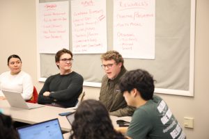 HSAC member Carter Daugherty ’25 speaks to the senate. Peerawut Ruangsawasdi // THE FLAT HAT