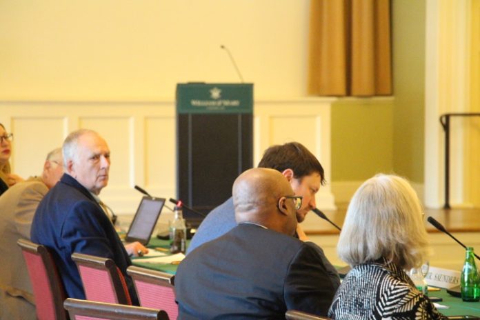 Board member Stephen J. Huebner '76, P '09 looks towards his right during a meeting of the Richard Bland College Committee in February. PEERAWUT RUANGSAWASDI // THE FLAT HAT