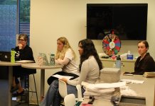 Director of Student Leadership Development Anne Arseneau ’89 MA.Ed ’92, SA President Sydney Thayer '24, SA Secretary of Data and Analytics Varsha Gollarhalli '25 and SA Secretary of Student Life Daly Martorano '24 at the May 2, 2023 SA Senate meeting.