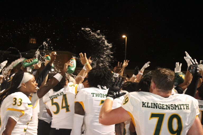 Tribe football outlasts Maine in rain-soaked home opener