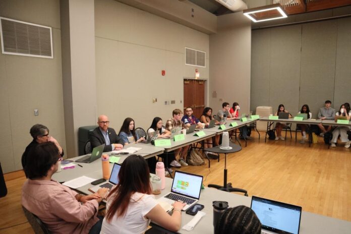 Associate Vice President for Public Safety Cliff Everton addressing the Student Assembly Senate on ZeroEyes.